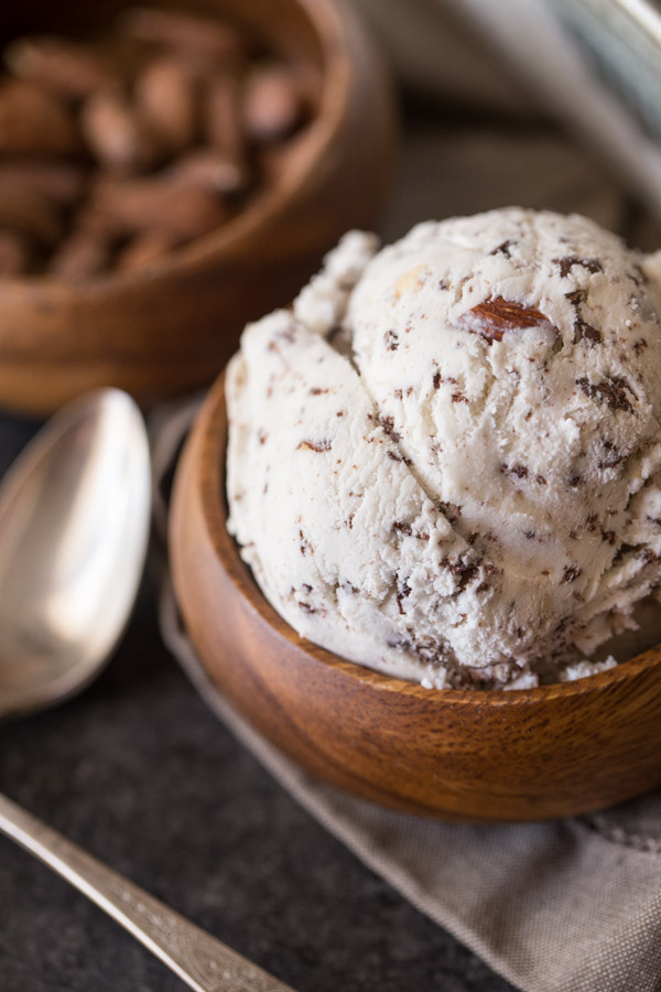 Dark Chocolate Almond Ice Cream - Homemade almond flavored ice cream with delicate flecks of dark chocolate and roasted, salted almonds!