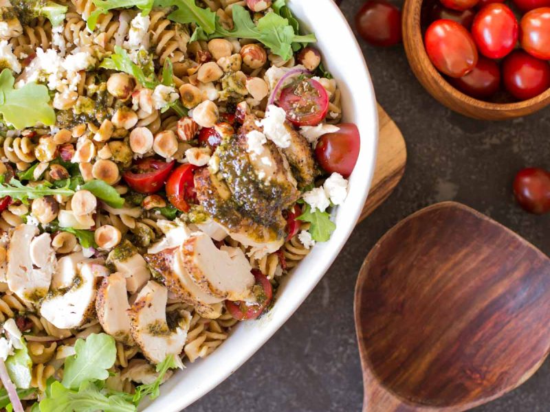 A healthy and fresh summertime pasta salad bursting with flavors. Tossed with a quick and easy vinaigrette!