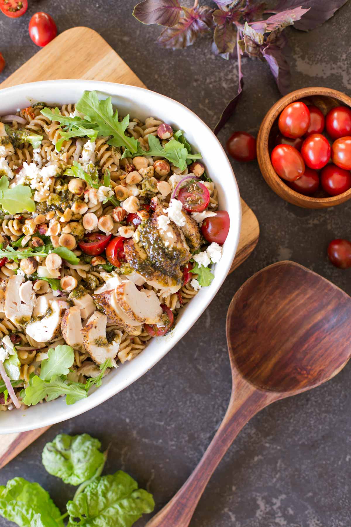 A healthy and fresh summertime pasta salad bursting with flavors. Tossed with a quick and easy vinaigrette!