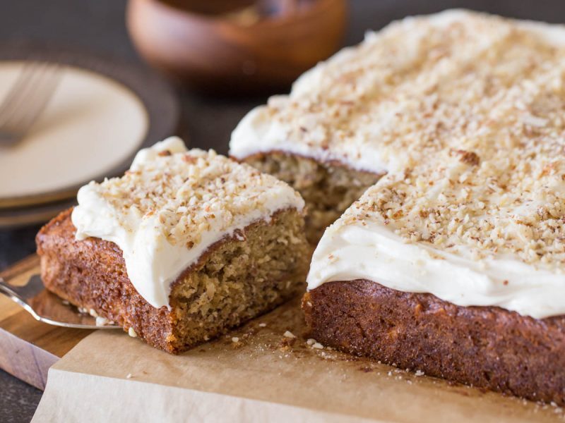 My very favorite banana bread recipe baked into a sweet, moist cake with the best and fluffiest cream cheese frosting!