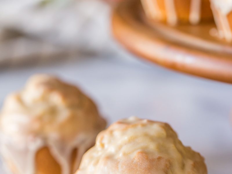 These Maple Glazed Donut Muffins are easy to make, fun to glaze, and have the texture of a cake donut!