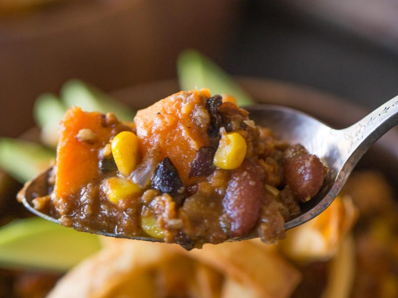 A hearty sweet potato chili with black beans, sausage and corn that'll fill you up and keep you going all winter long. Just the right amount of sweet and spicy!