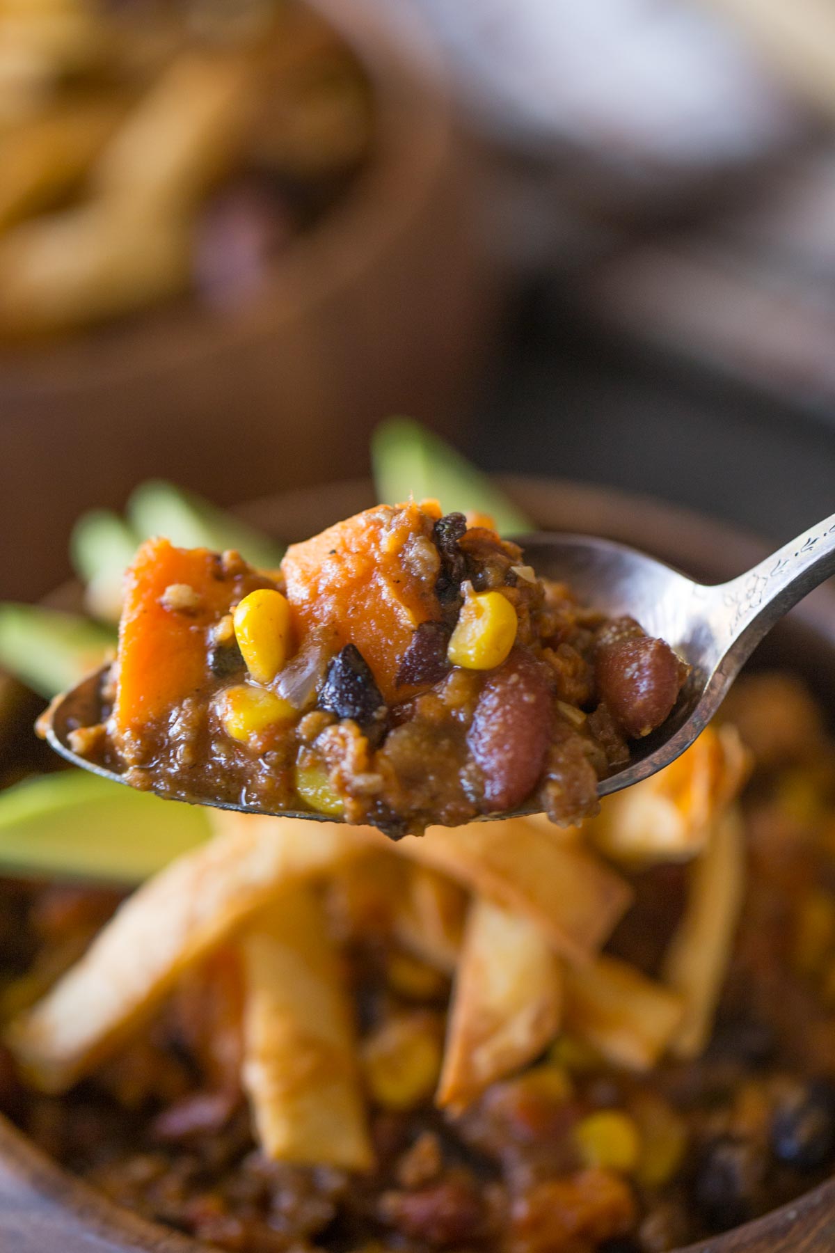 A hearty sweet potato chili with black beans, sausage and corn that'll fill you up and keep you going all winter long. Just the right amount of sweet and spicy!