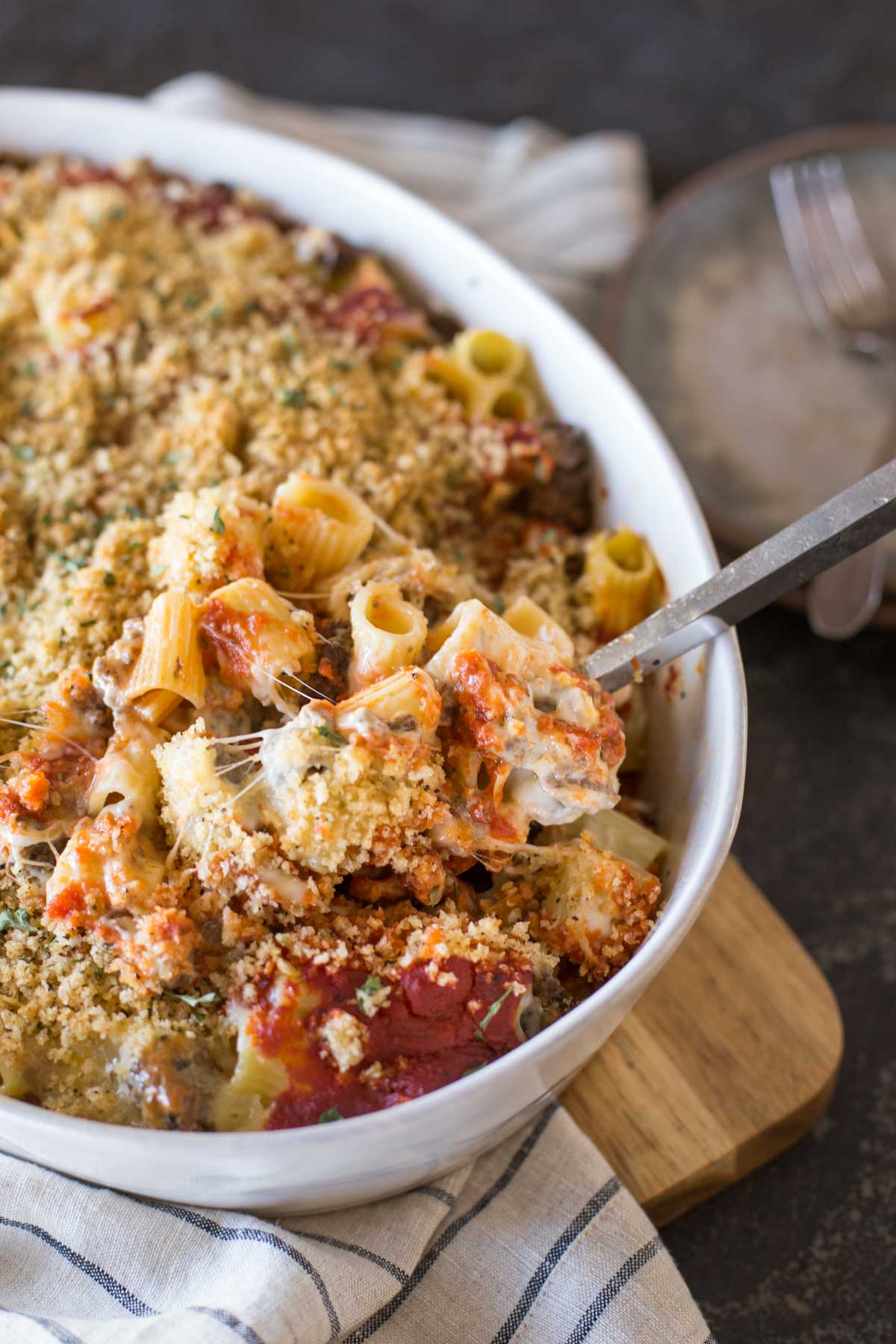 Cheesy Tomato Alfredo Pasta Bake in a baking dish.
