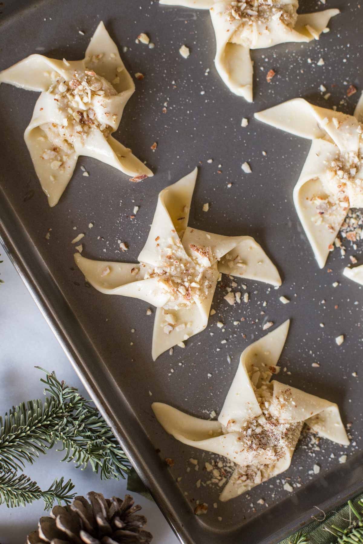 Make Ahead Almond Pinwheels on a baking sheet before being baked.  