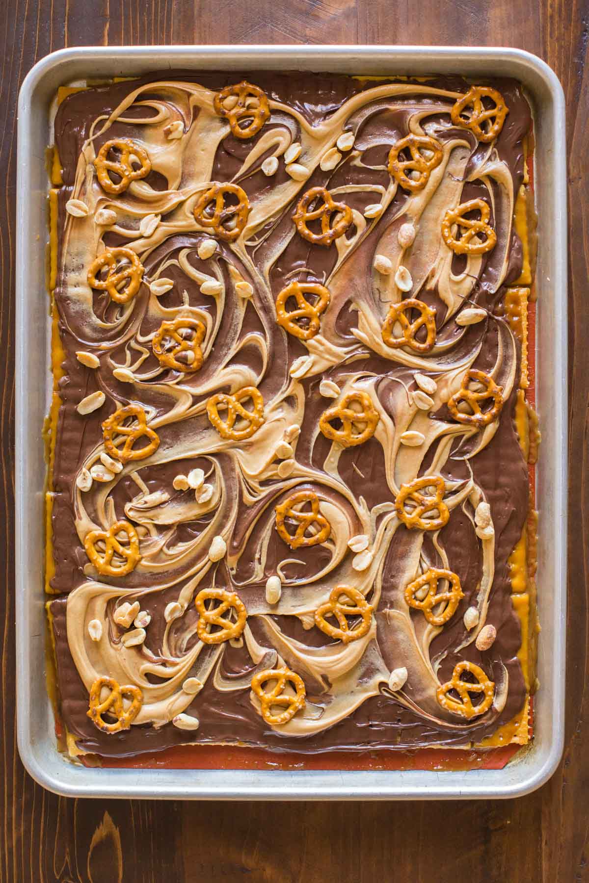 Take Five Cracker Bark on a Silpat lined, rimmed baking sheet. 