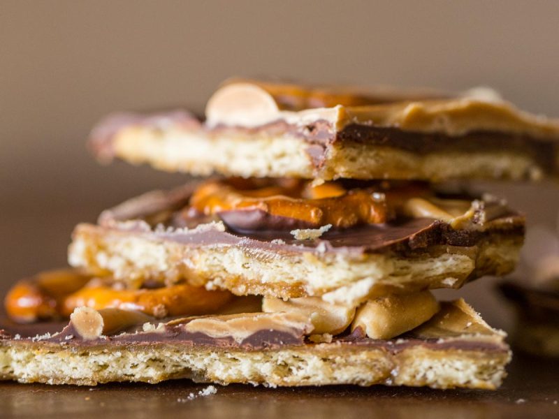 This Take Five Cracker Bark has a butter cracker base with layers of caramel, chocolate, peanut butter, pretzels and peanuts! So delicious and addicting!