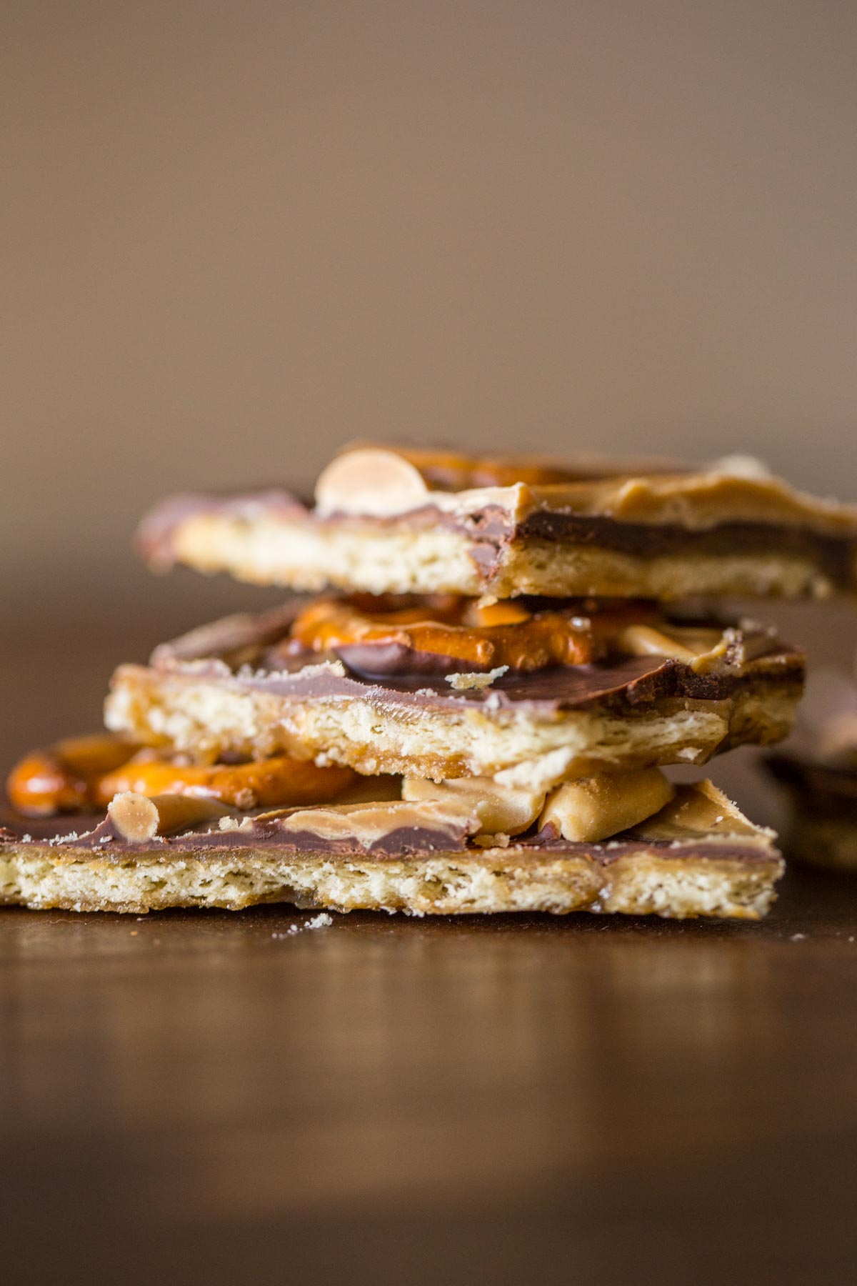 This Take Five Cracker Bark has a butter cracker base with layers of caramel, chocolate, peanut butter, pretzels and peanuts! So delicious and addicting!