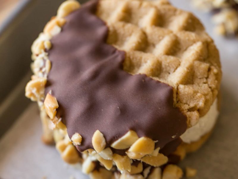 We've got soft peanut butter cookies with vanilla ice cream, a milk chocolate coating and crushed peanuts - OH MY!!! Just what summer needs!