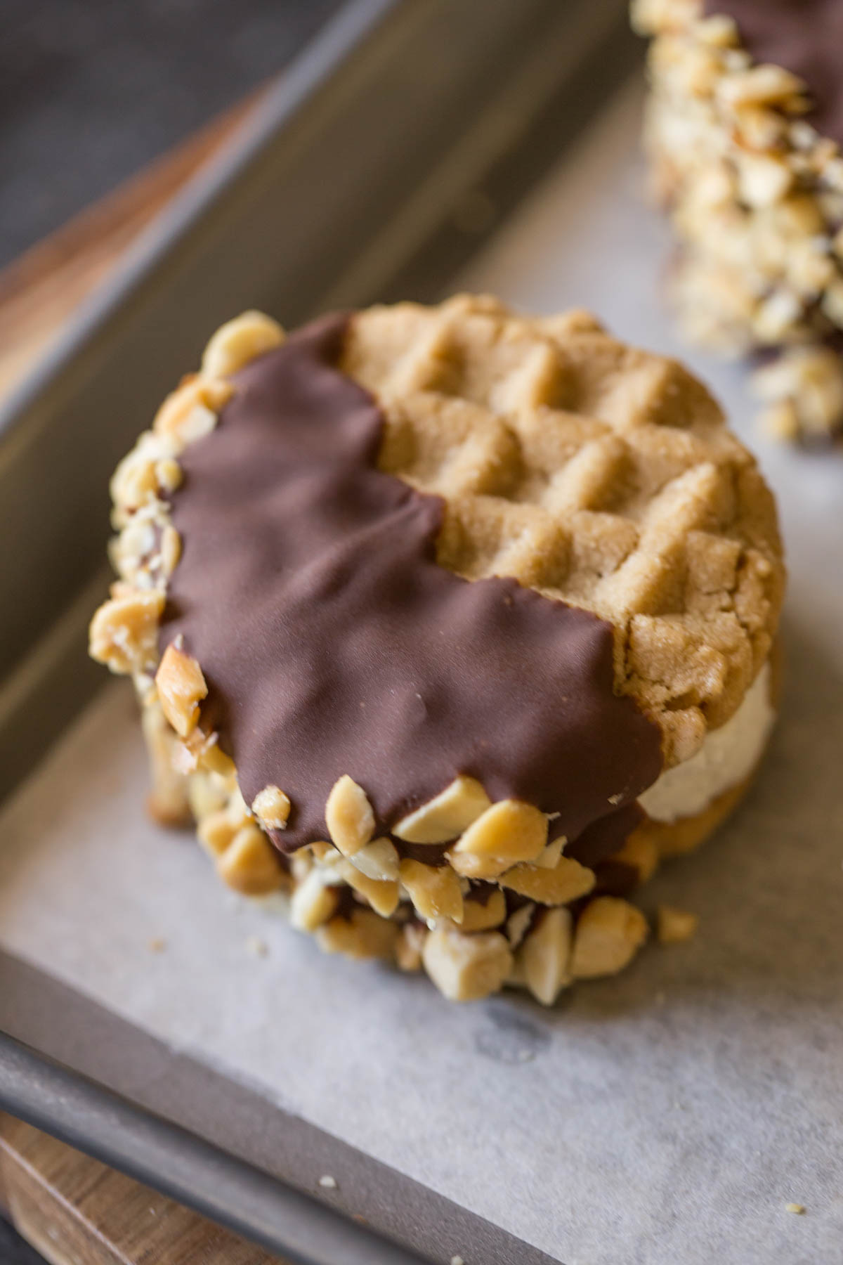 We've got soft peanut butter cookies with vanilla ice cream, a milk chocolate coating and crushed peanuts - OH MY!!! Just what summer needs!