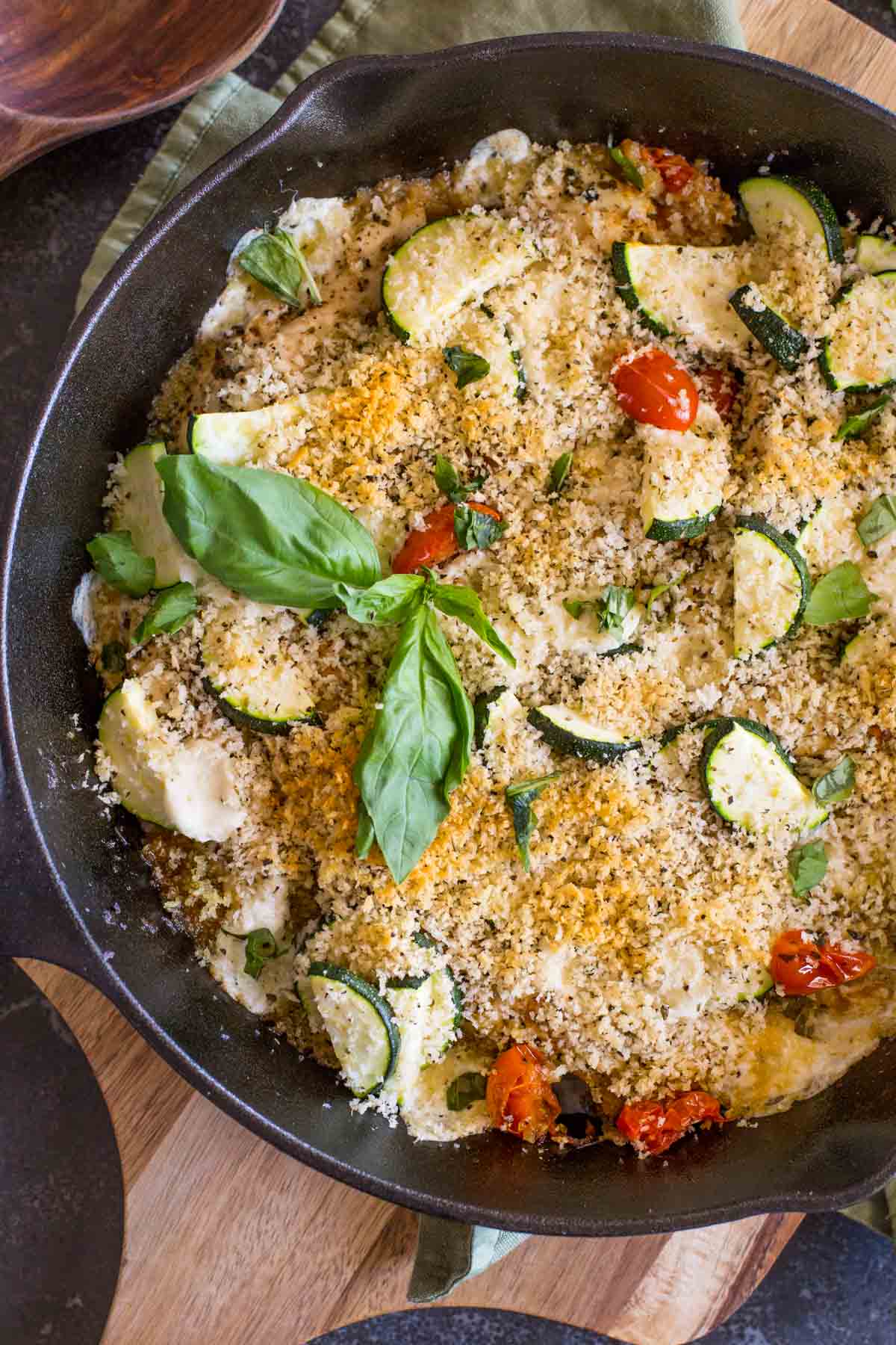 Pesto Chicken Skillet garnished with some fresh basil.