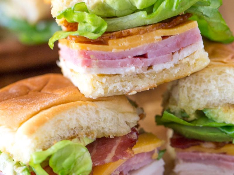 These Ultimate Club Sandwiches for a crowd come together quickly and everyone loves them, especially with avocado and bacon! Bet they won't last long.