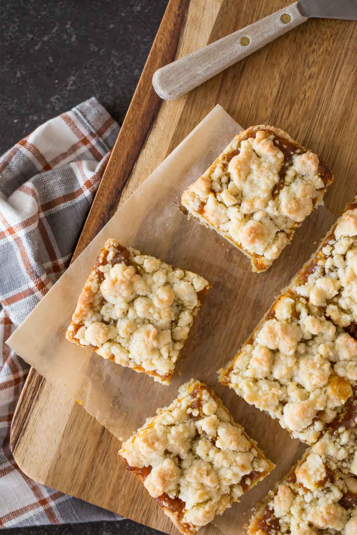 Pumpkin Butter Crumb Bars on a cutting board.  