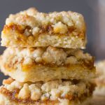 These Pumpkin Butter Crumb Bars have a soft buttery crust, a layer of pumpkin butter, and more buttery crumbles on top.  They are quick and easy too!