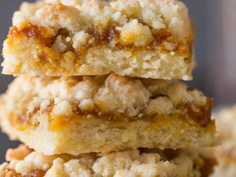 These Pumpkin Butter Crumb Bars have a soft buttery crust, a layer of pumpkin butter, and more buttery crumbles on top.  They are quick and easy too!