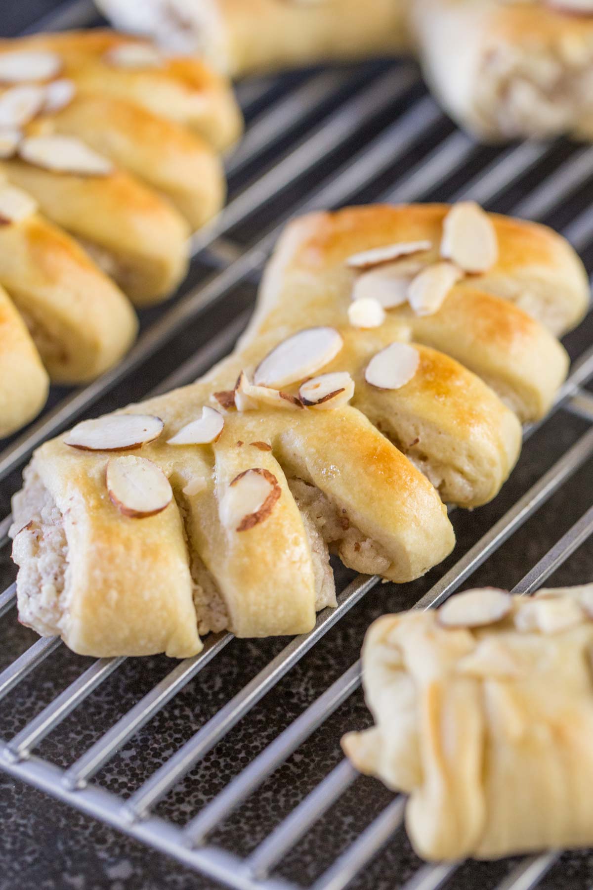 These Buttery Almond Bear Claws are a family tradition that I love. Who could resist that tender pastry with the sweet almond filling?