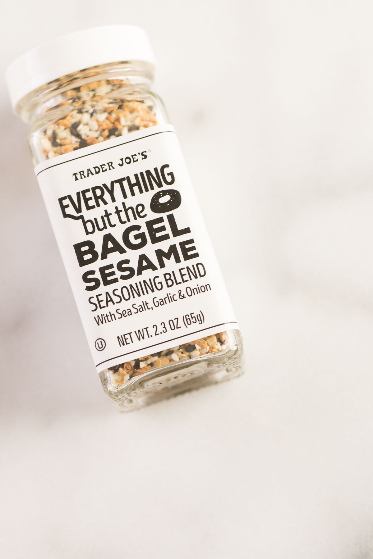 We've got creamy avocado and baby greens dressed with freshly squeezed lemon juice and sprinkled with crispy bacon and Everything But the Bagel Seasoning. Start your morning off right!