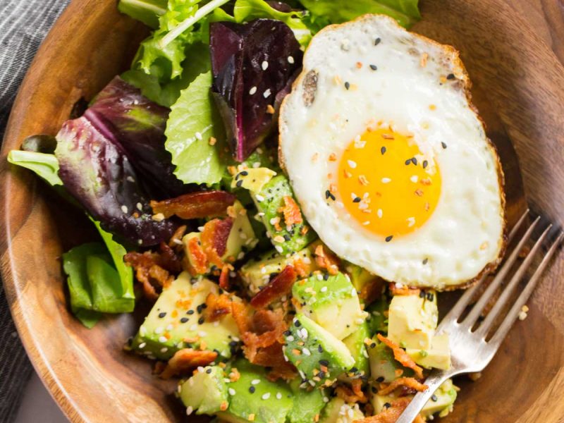 We've got creamy avocado and baby greens dressed with freshly squeezed lemon juice and sprinkled with crispy bacon and Everything But the Bagel Seasoning. Start your morning off right!