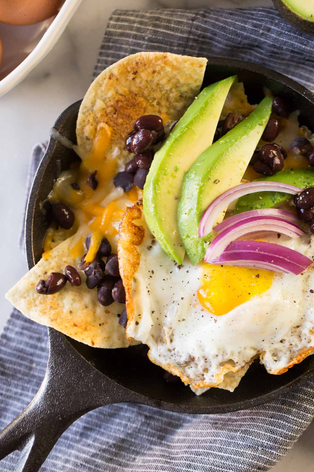 If you've ever dreamed of having chips and salsa for breakfast, these Breakfast Nacho Skillets are for you. The secret is definitely in that sauce!