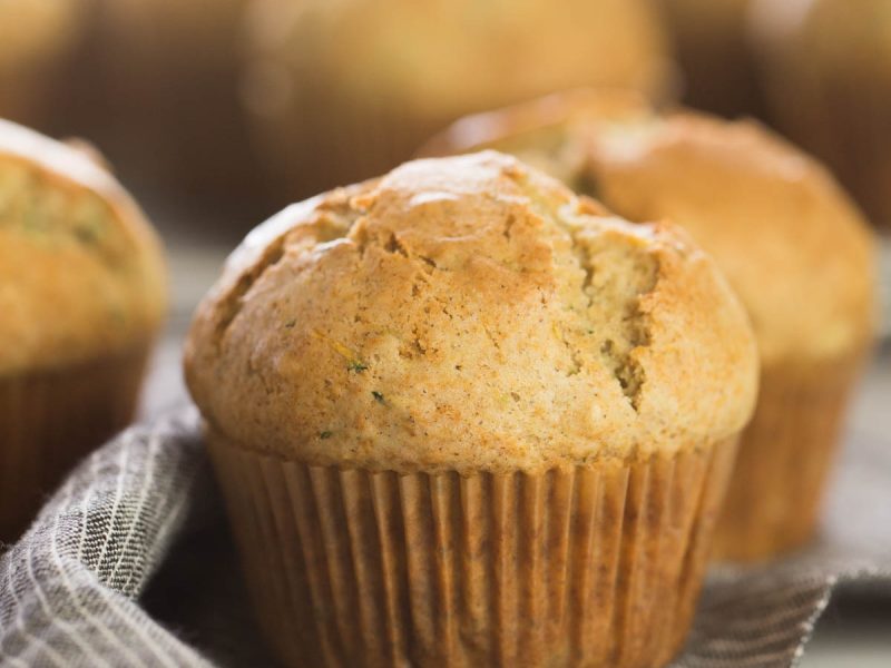 These Healthier Zucchini Muffins are just right with lots of grated zucchini, a little bit of spice, and just a touch of sweetness.  