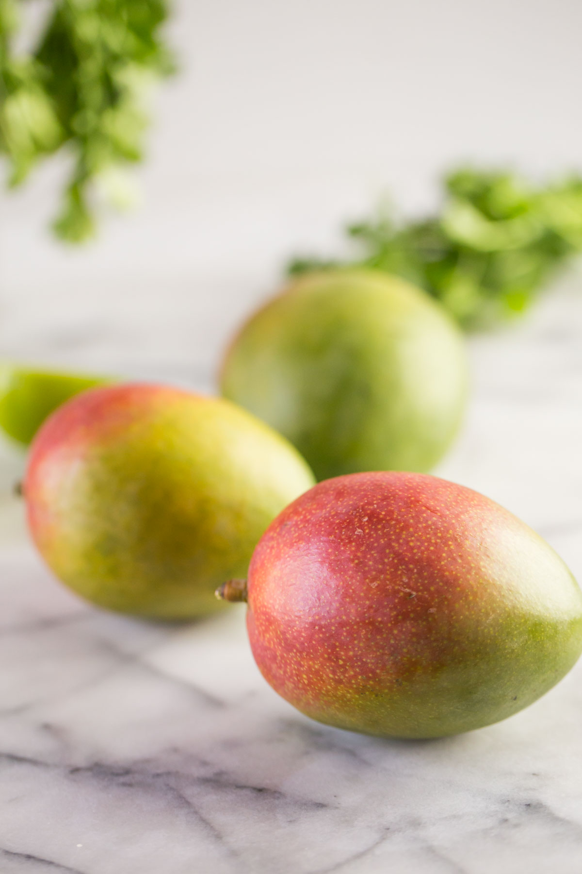Three whole mangos. 