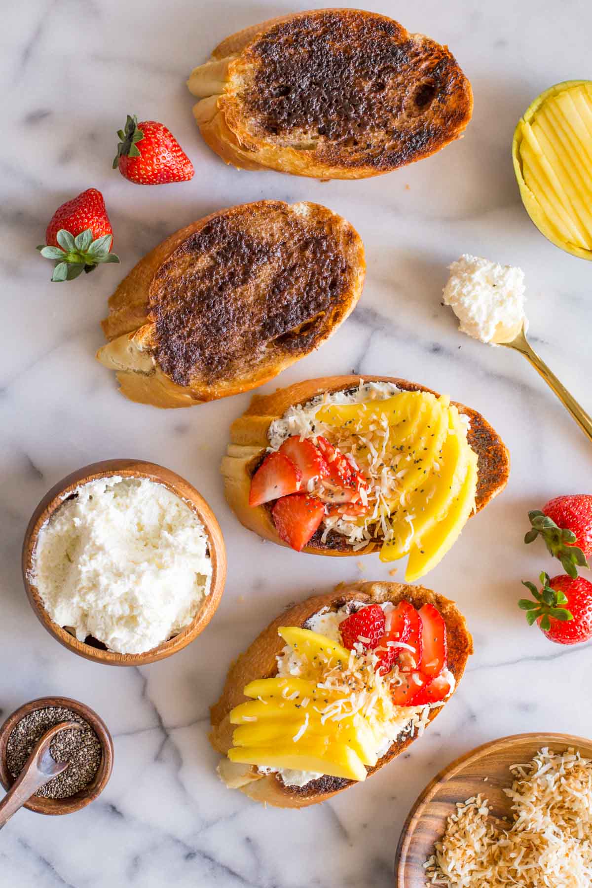 Top down view of Strawberry Mango Cinnamon Toast and ingredients.