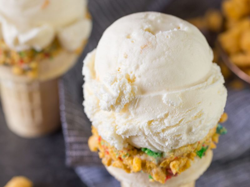 Homemade Cereal Milk Ice Cream in a cone.