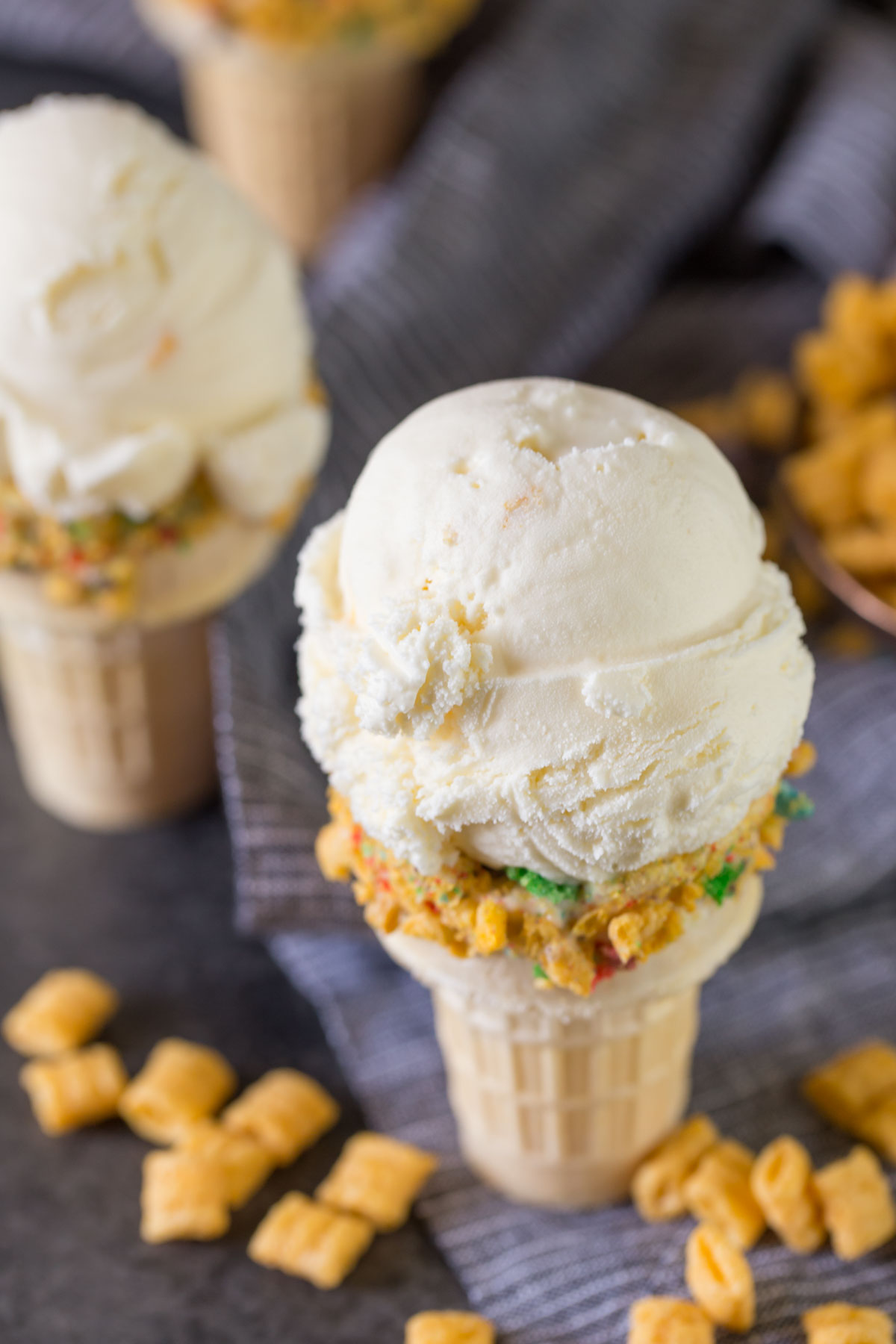Homemade Cereal Milk Ice Cream in a cone.