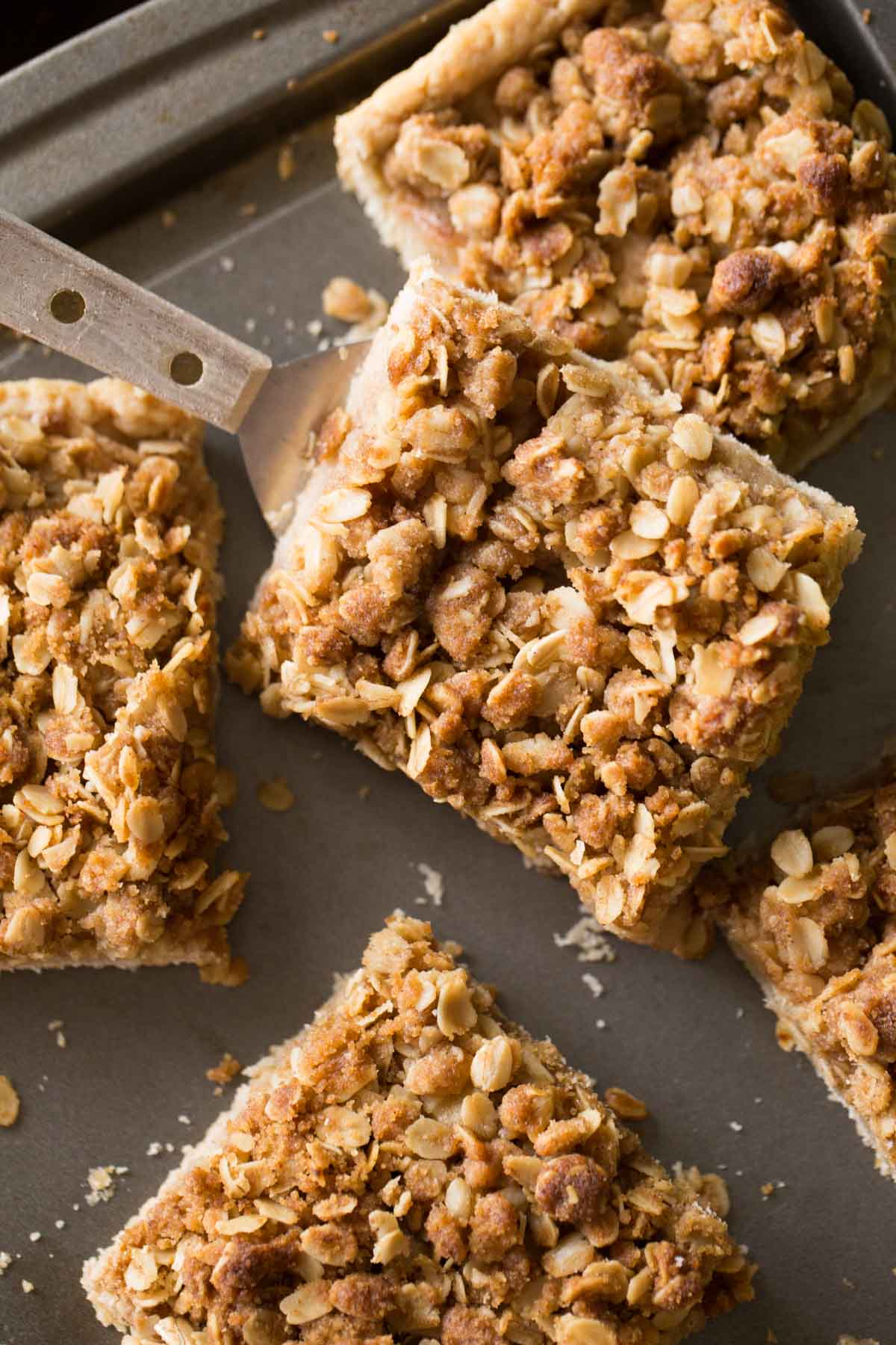 A top down view of a Dutch Apple Slab Pie on a metal baking sheet.