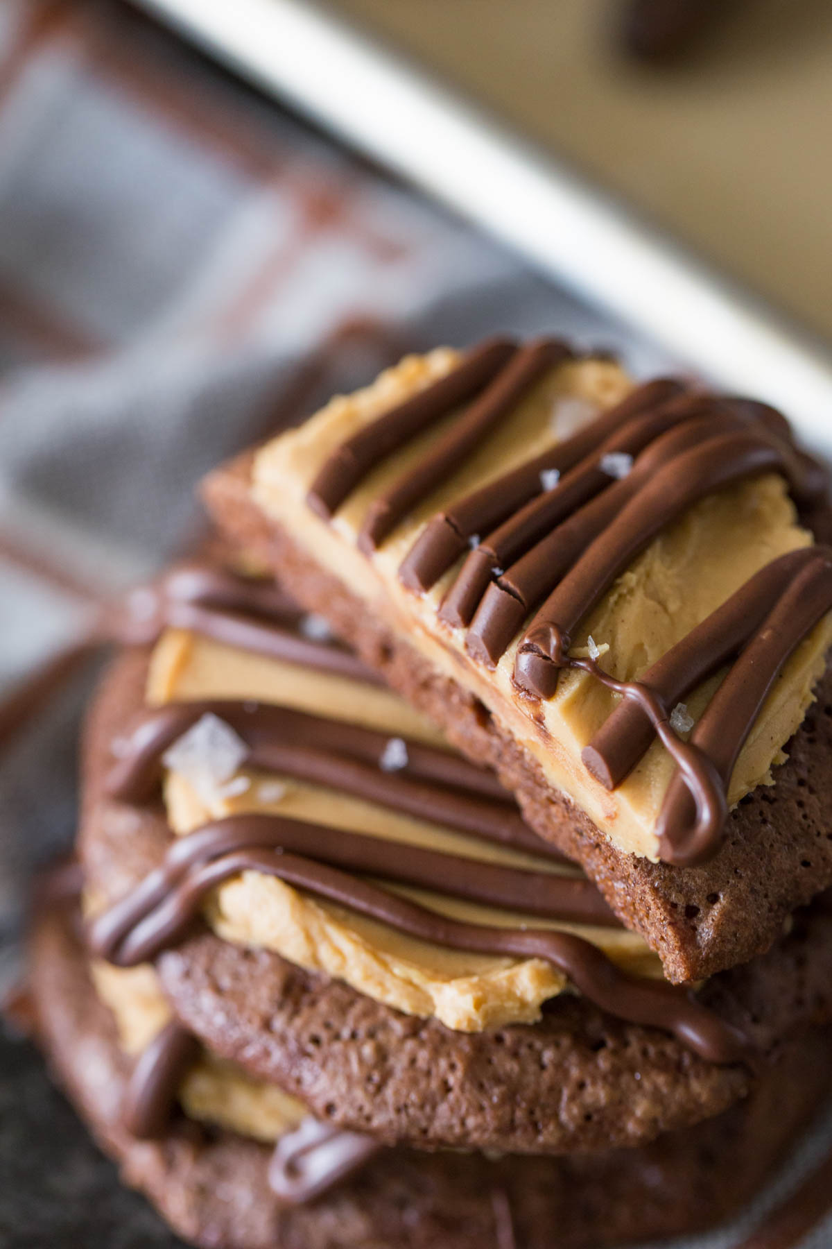 Stack of Peanut Butter Buckeye Brownie Cookies.
