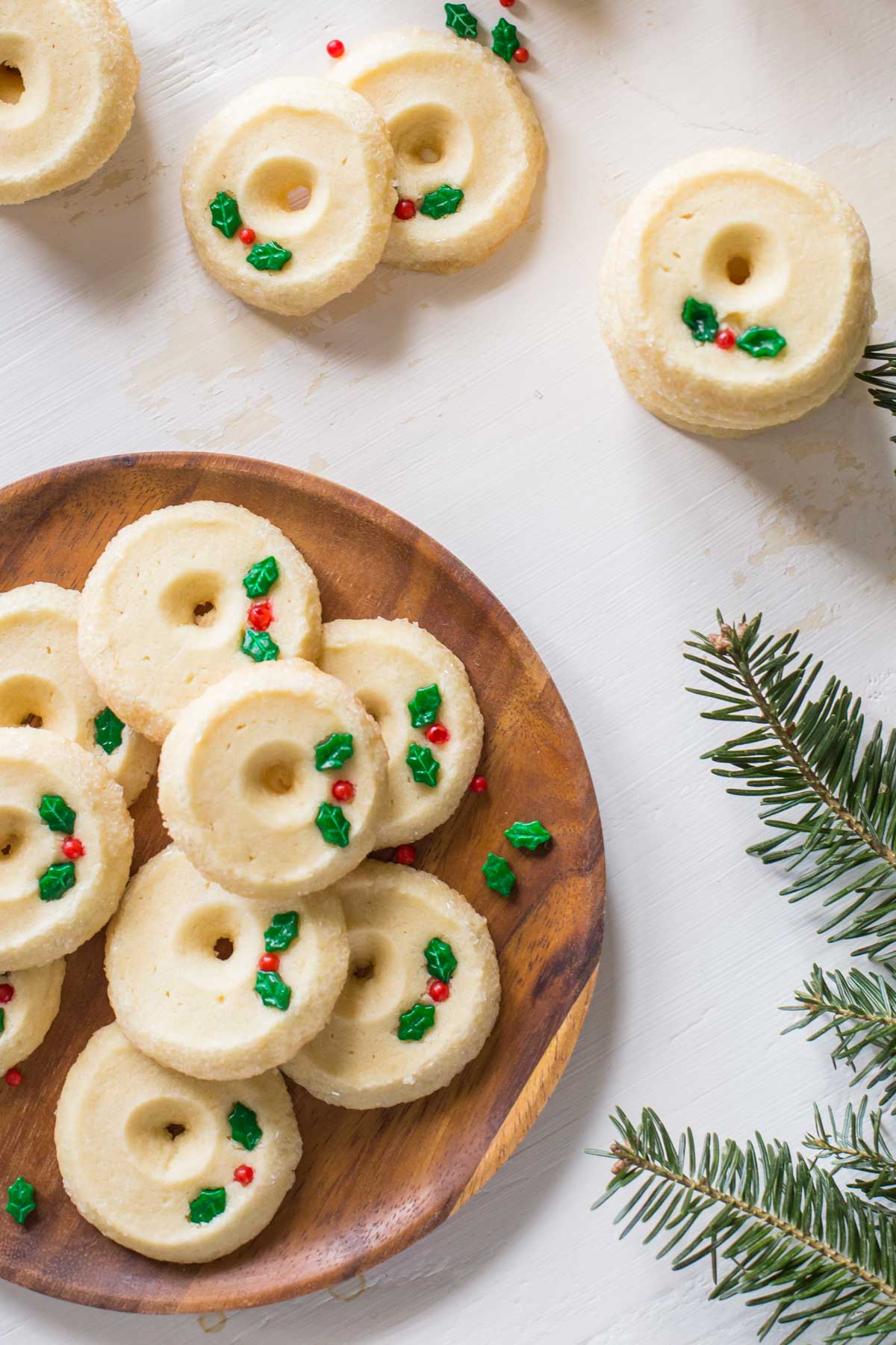 Overhead view of Slice and Bake Shortbread Cookies on a wooden plate.