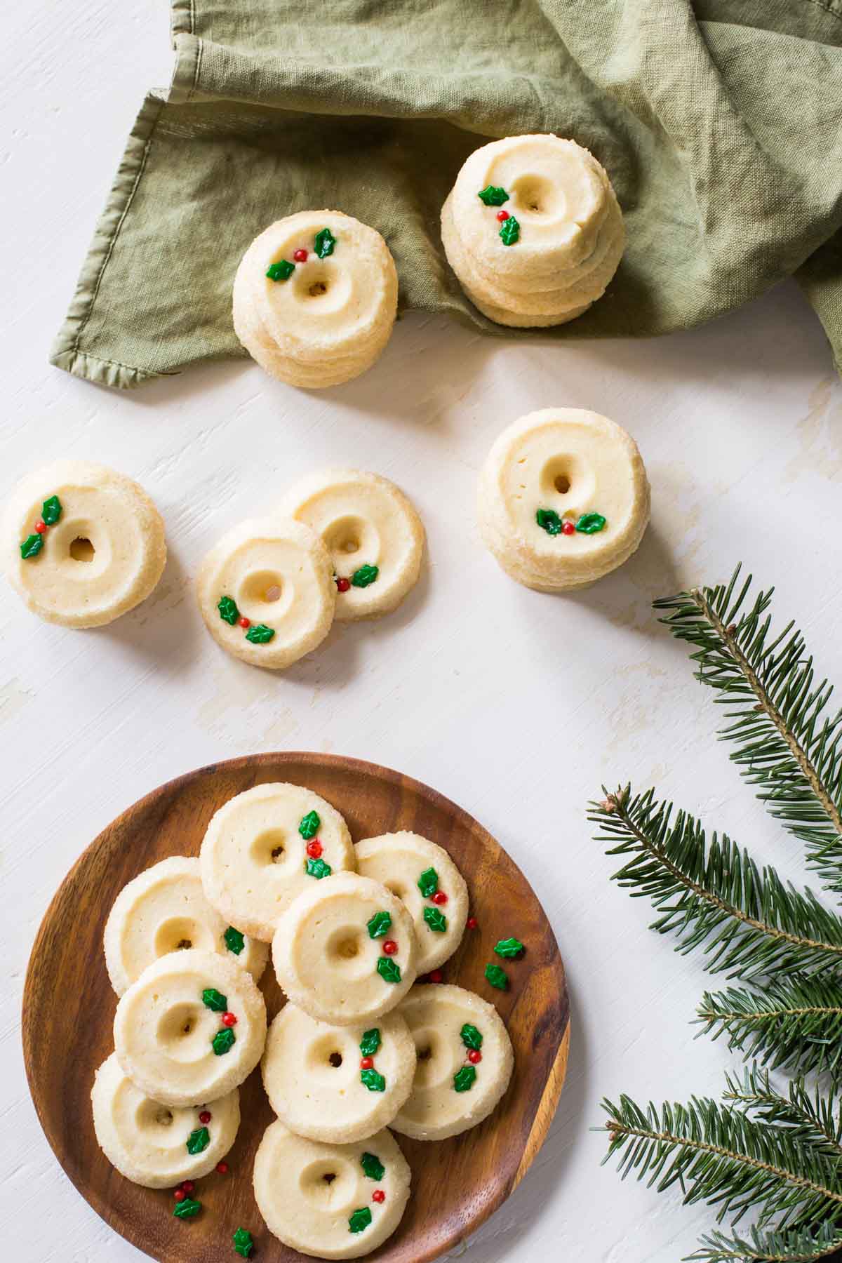 Overhead view of Slice and Bake Shortbread Cookies on a wooden plate.