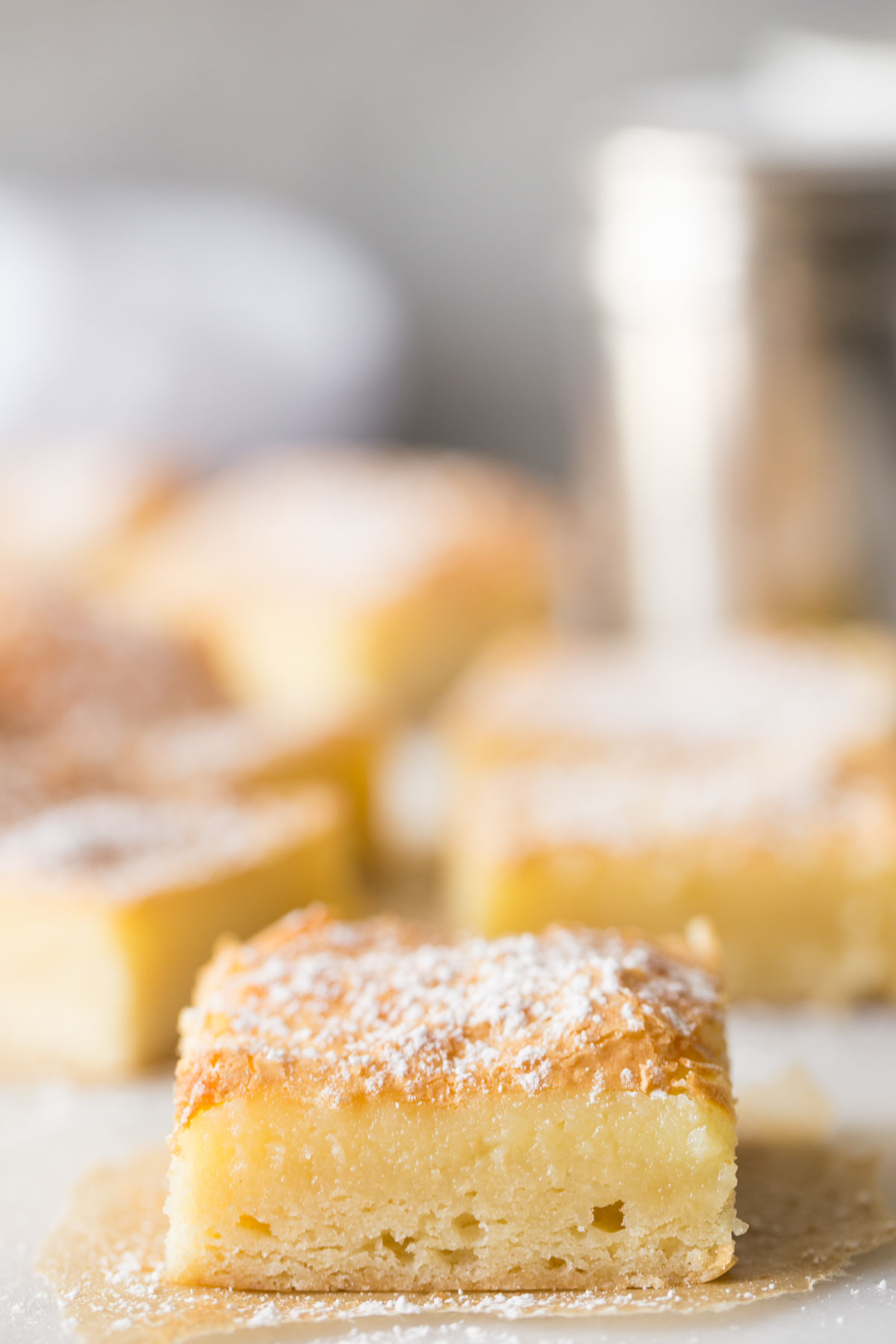 Close up view of three distinct layers of Gooey Butter Bars.