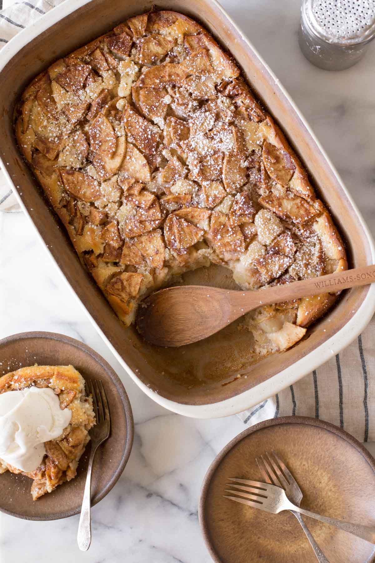 Overhead view of Apple Cobbler on a marble background.