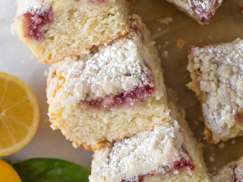 Overhead shot of stacked pieces of Lemon Raspberry Cream Cheese Coffee Cake.