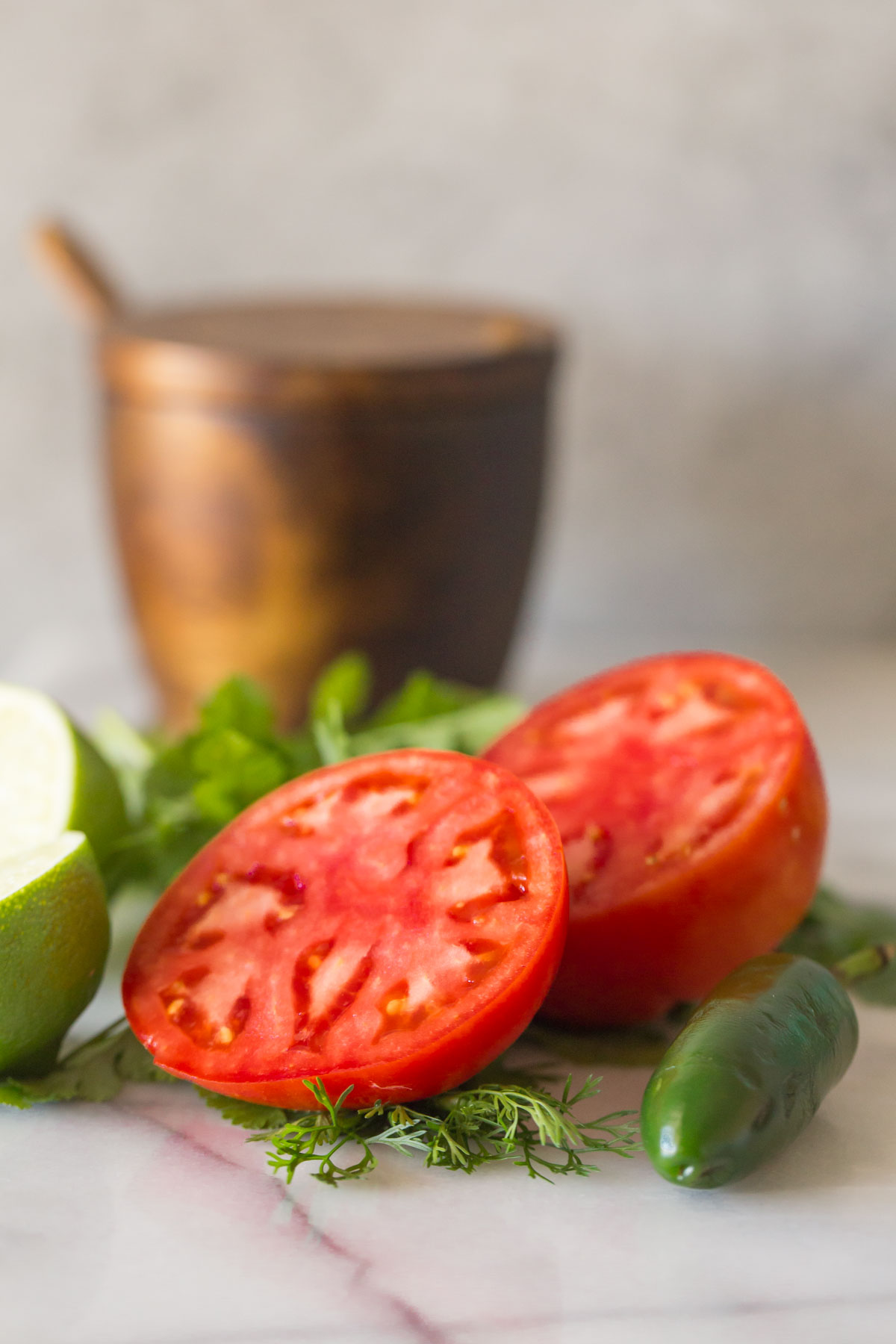 Close up of a sliced homegrown tomato.