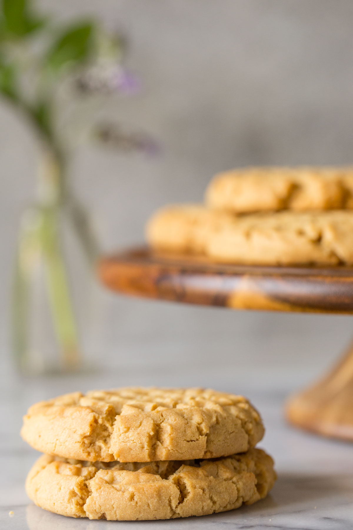 A small stack of Soft and Chewy Peanut Butter Cookies.