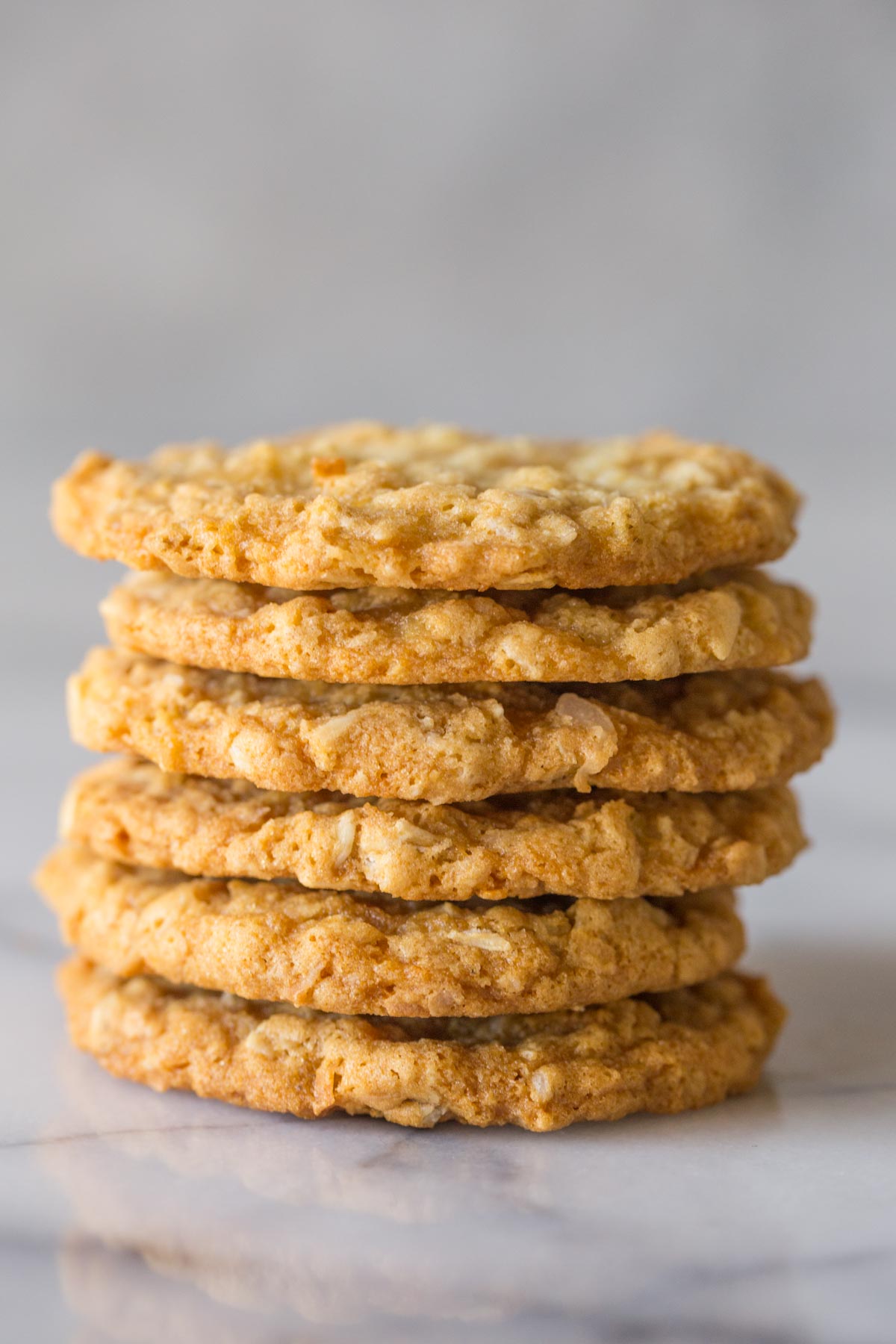 Close up shot of a stack of Buttery Coconut Oatmeal Cookies.