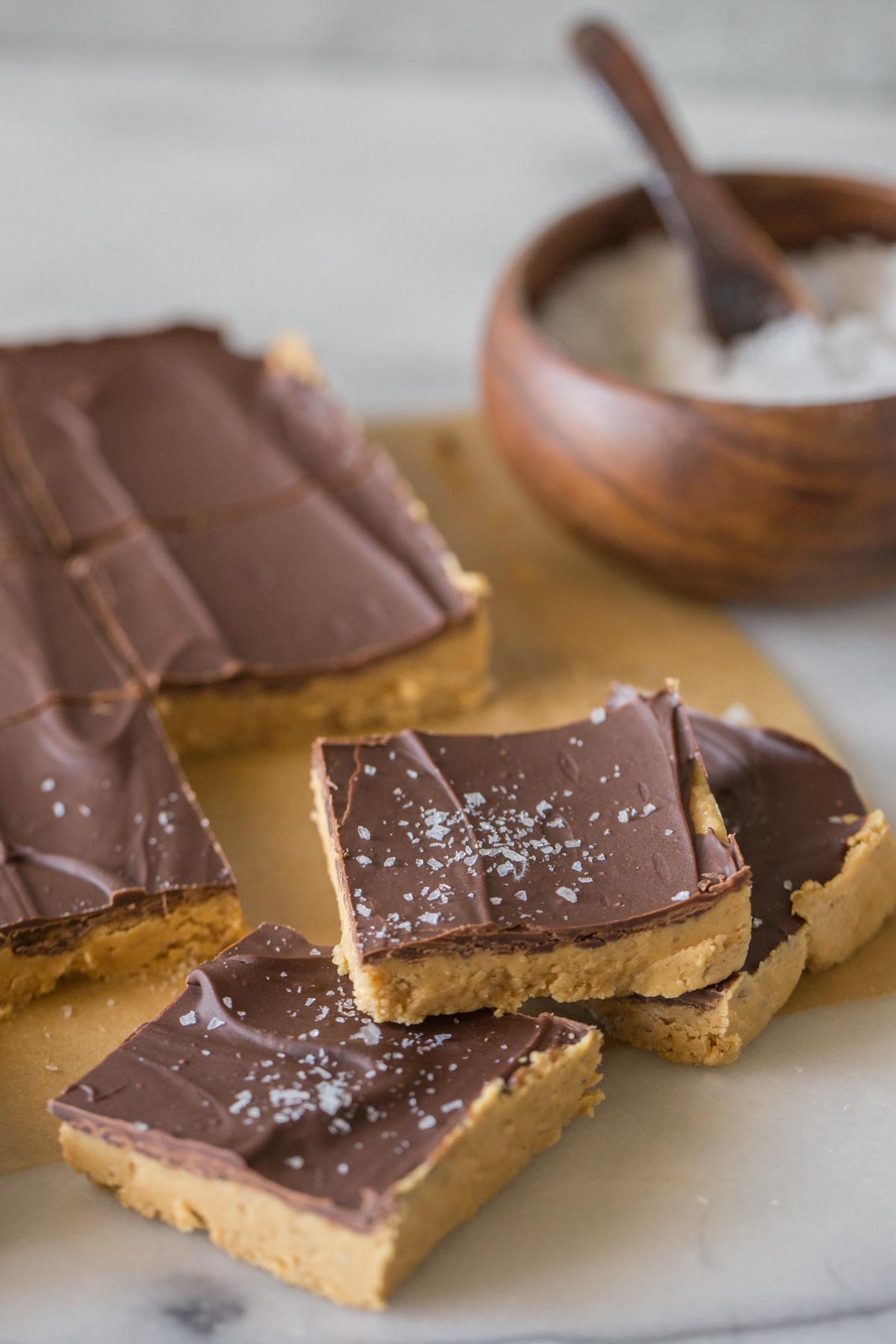 Stack of Chocolate Peanut Butter Bars with Maldon sea salt on top. 