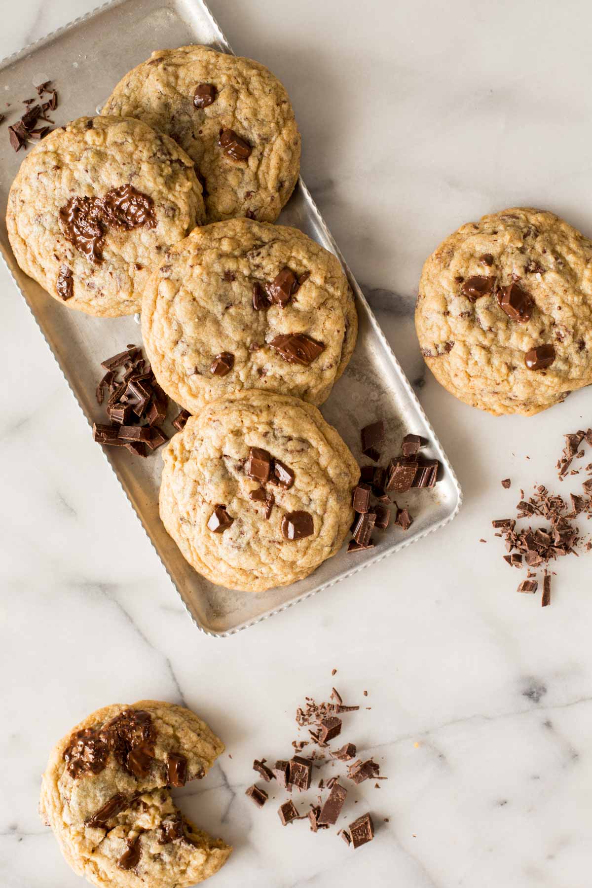 Overhead shot of Perfect Chocolate Chunk Cookies on a marble barckground.
