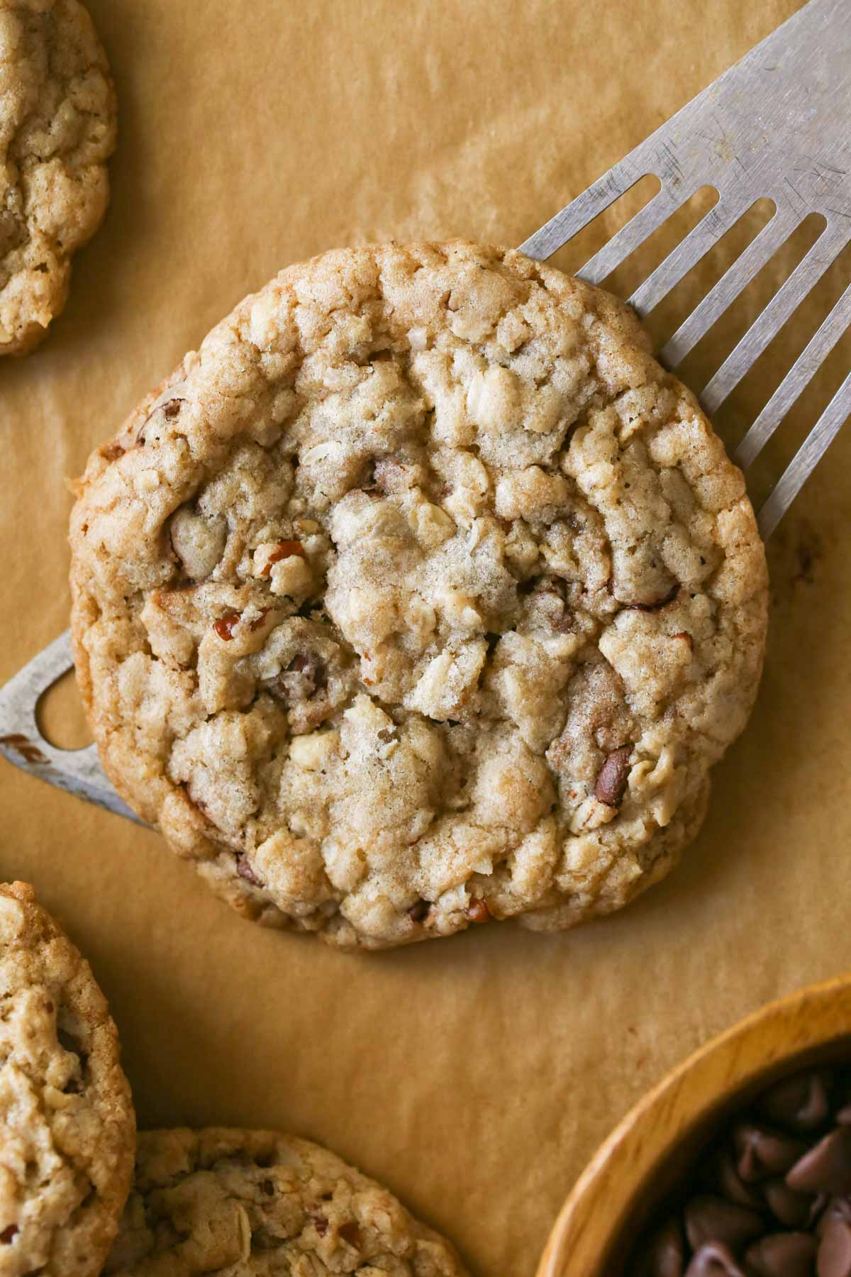 Close up shot of a Cowboy Cookie on a spatula.