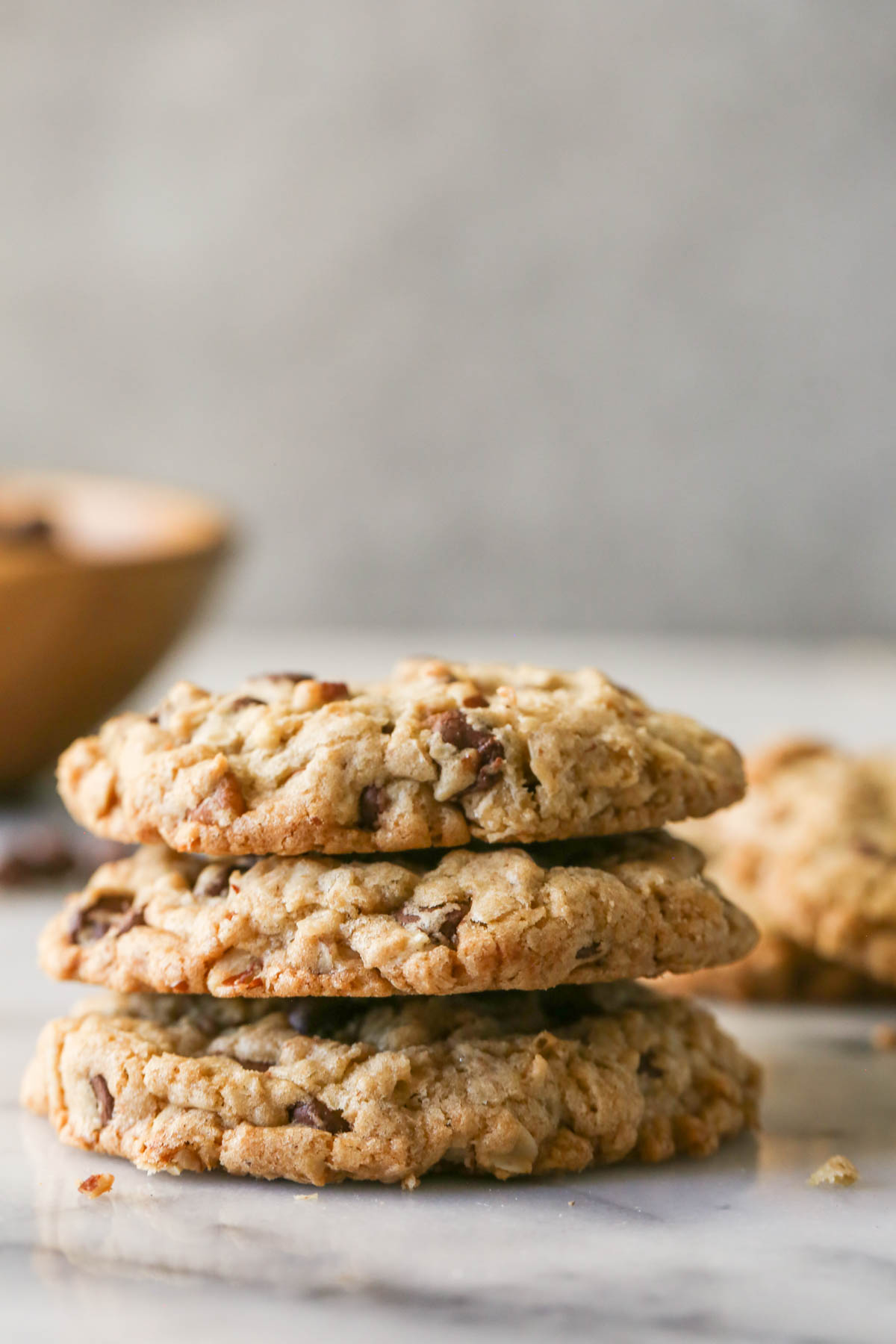 Three Cowboy Cookies stacked on top of each other.