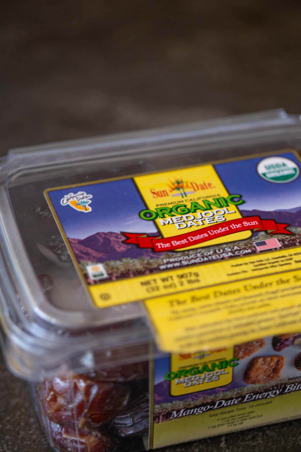 A close up shot of a container of organic Medjool dates used for the Copycat Sprouts Date Coffee Smoothie.